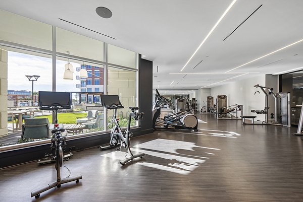 Fully-equipped fitness center at Element SouthPark Apartments with modern amenities for an active lifestyle