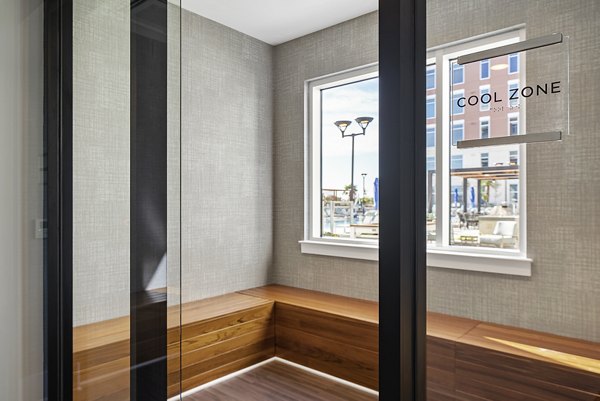State-of-the-art fitness center with sauna at Element SouthPark Apartments for luxury wellness living