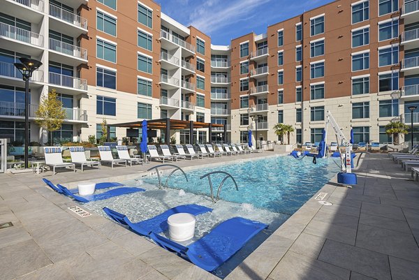 Relax by the sparkling outdoor pool at Element SouthPark Apartments, a vibrant community offering luxury living in an ideal location
