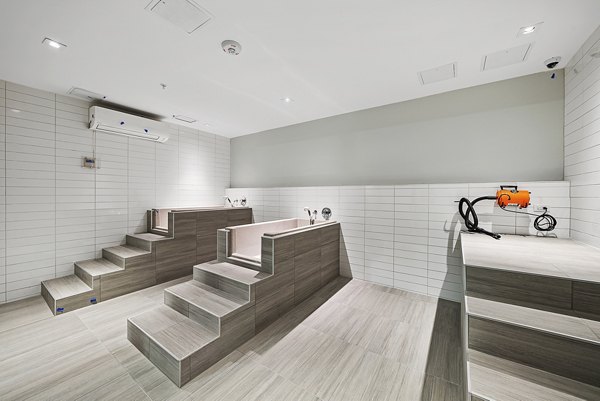 Convenient dog wash station at Element SouthPark Apartments, ideal for pet-friendly living