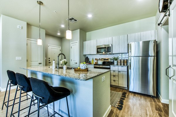 dining room at Amiya Apartments 