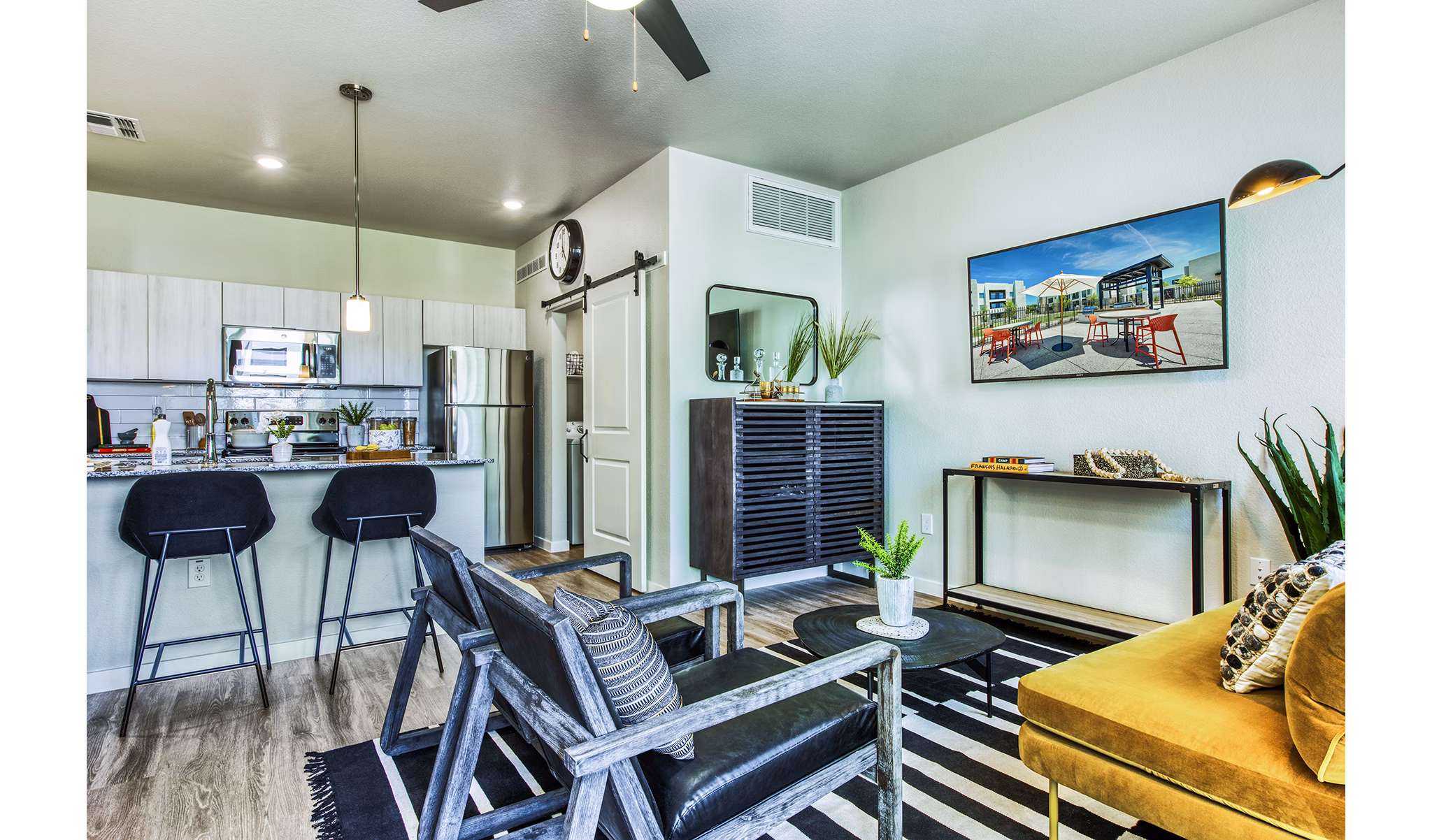Living room featuring elegant decor and modern furniture at Amiya Apartments luxury apartments