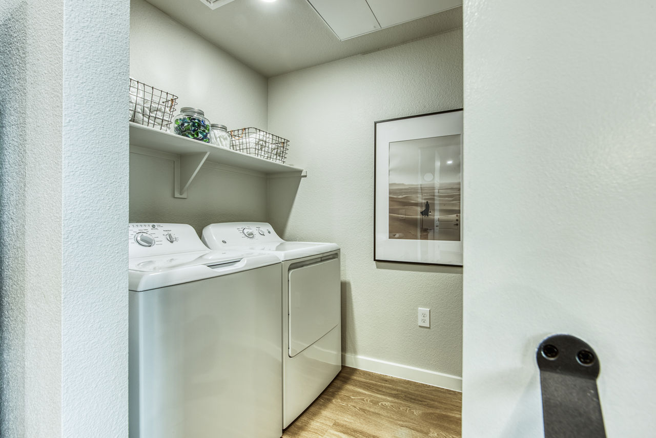 Laundry room at Amiya Apartments