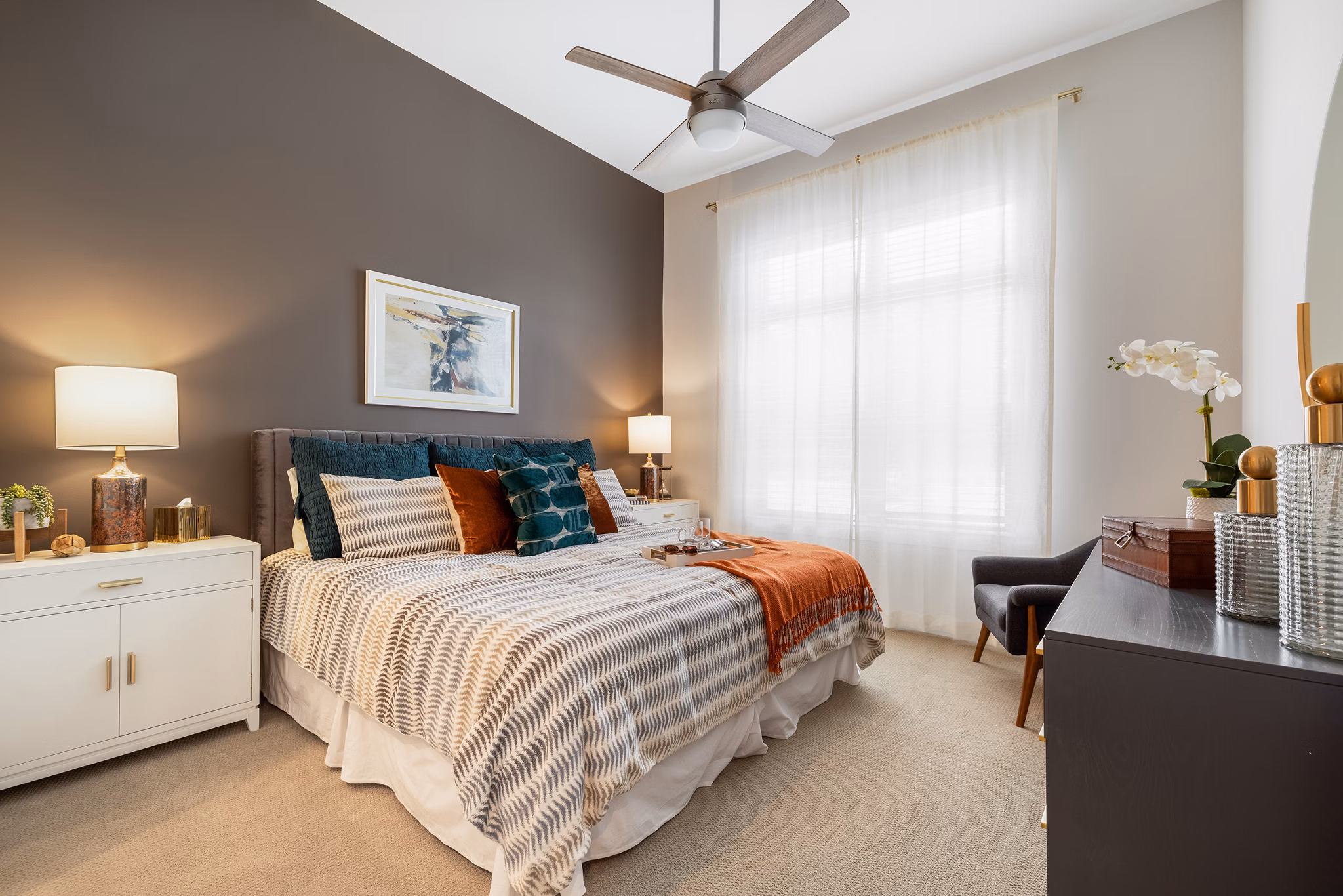 Elegant bedroom with modern furnishings at Overture Cary Apartments