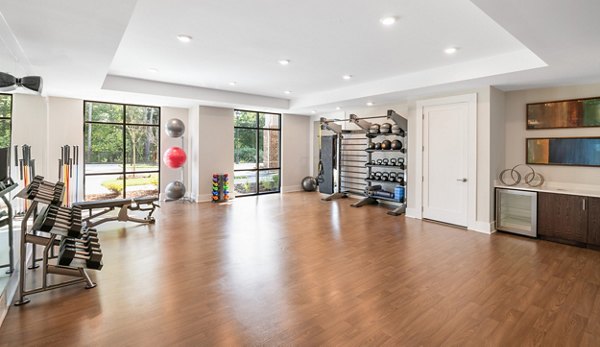 Yoga and spin studio featuring modern equipment at Overture Cary Apartments