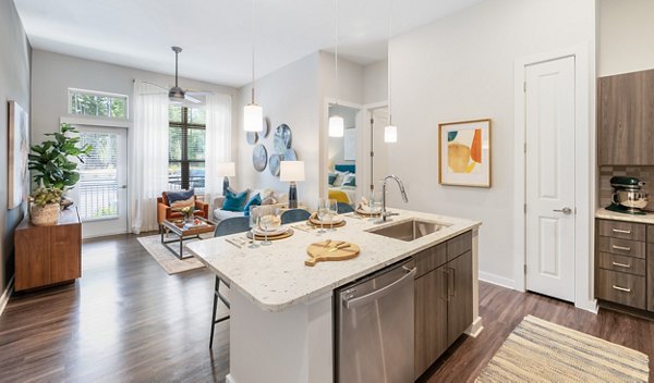 Modern kitchen featuring stainless steel appliances at Overture Cary Apartments