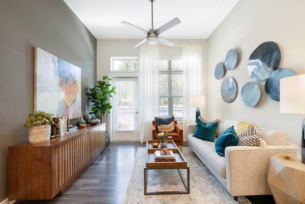 Spacious living room with modern decor in Overture Cary Apartments