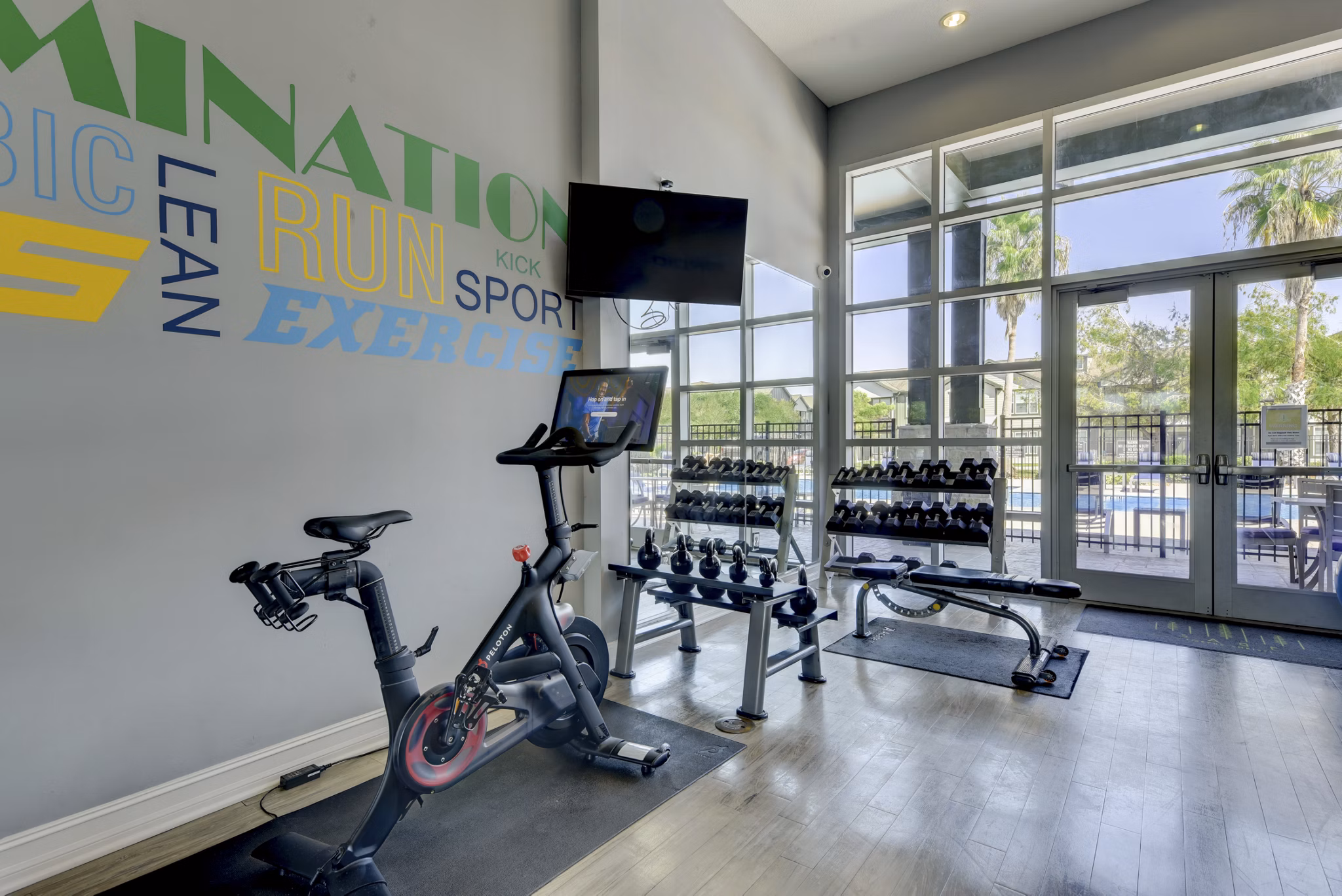 Sage Apartments: State-of-the-art fitness center with modern equipment for luxury living