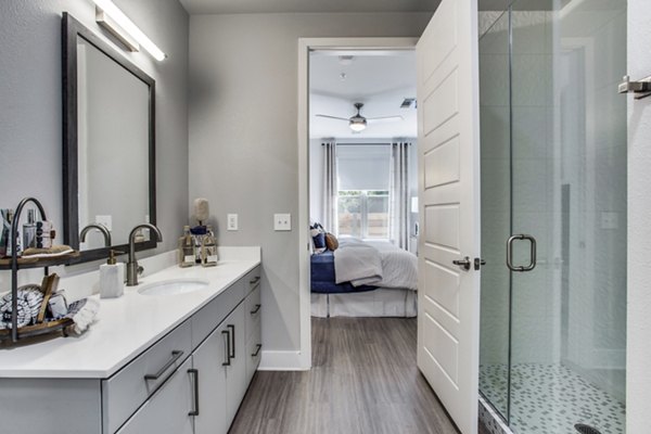 Bathroom featuring modern fixtures in Trailhead Apartments, a Greystar luxury property