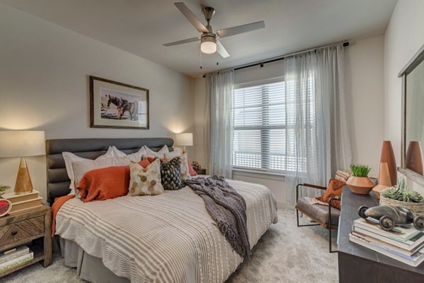 Cozy bedroom with modern decor at Album Keller Ranch Apartments, luxury living Ideal for restful nights and relaxation