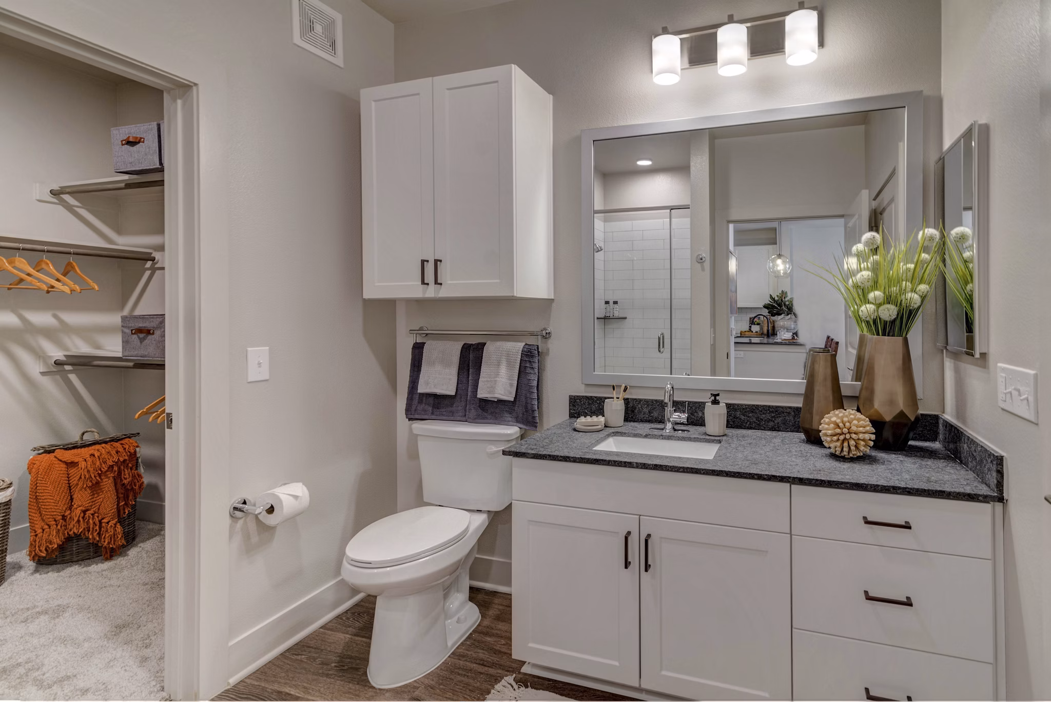 Bathroom with modern fixtures at Album Keller Ranch Apartments featuring sleek cabinetry and elegant tilework