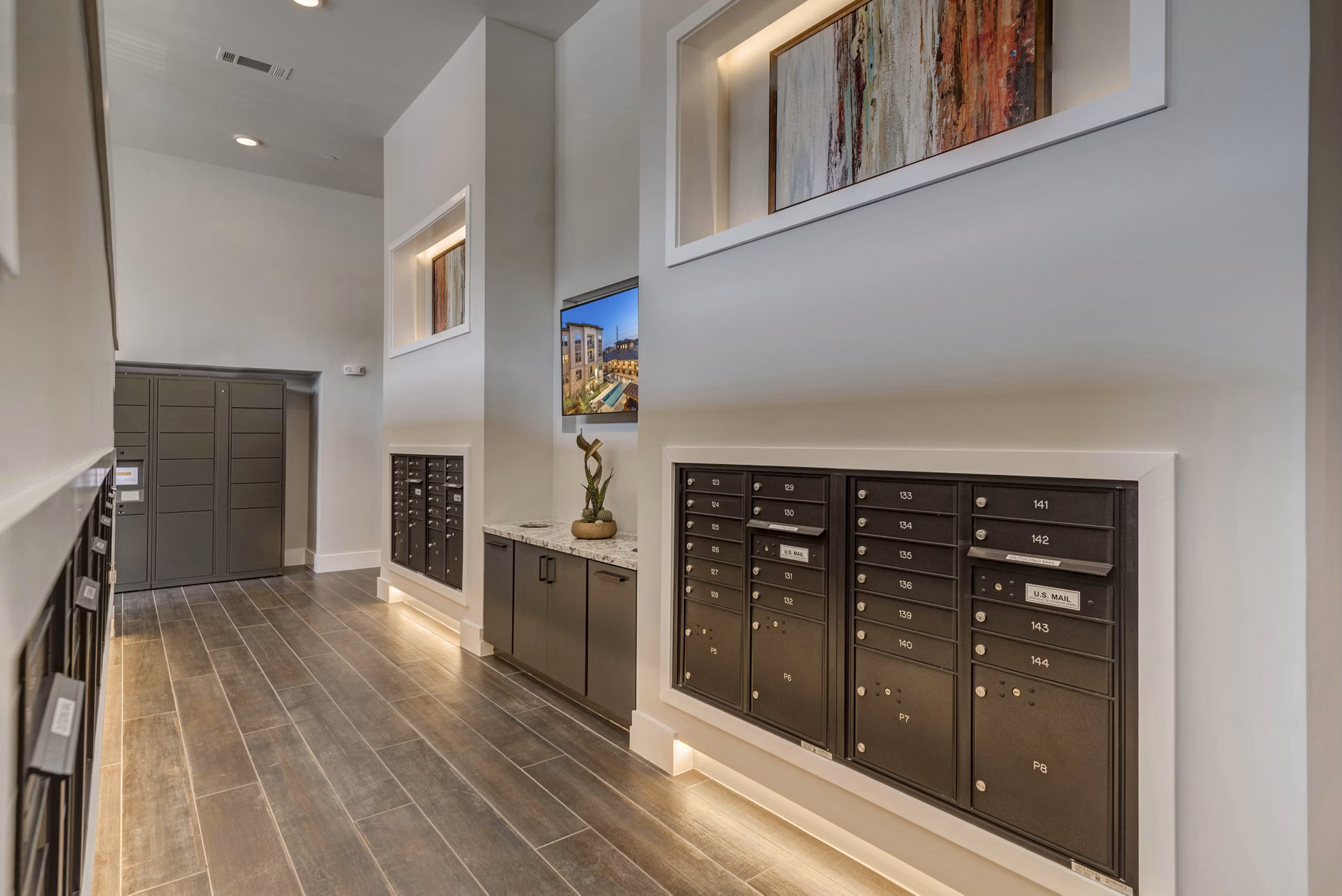 Modern mail room with secure package lockers at Album Keller Ranch Apartments