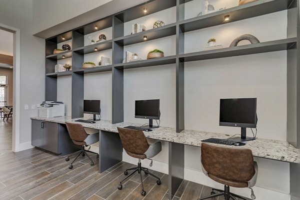 Modern business center with sleek workstations at Album Keller Ranch Apartments, perfect for productivity and collaboration