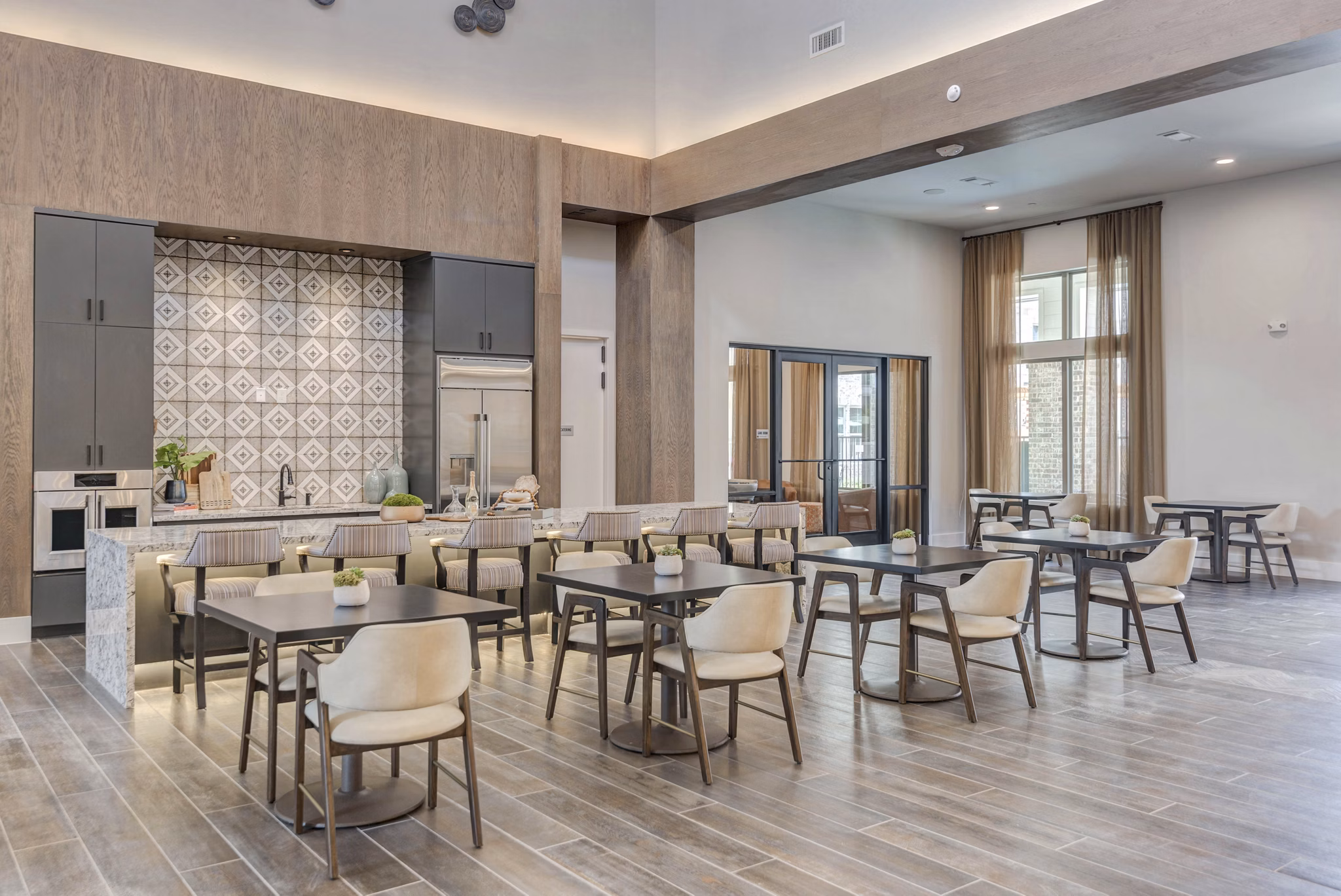 Stylish clubhouse dining area with modern decor at Album Keller Ranch Apartments