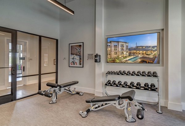 Modern fitness center with state-of-the-art equipment at Album Keller Ranch Apartments