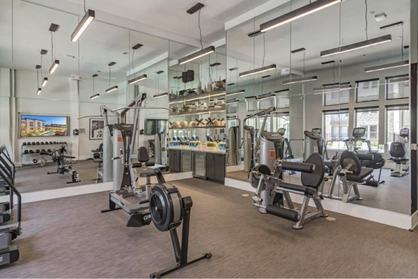 State-of-the-art fitness center with modern equipment at Album Keller Ranch Apartments