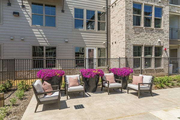 patio with seating at Album Keller Ranch Apartments
