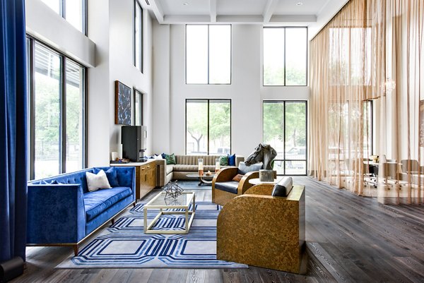 Clubhouse lobby with modern decor at Mezzo Kirby Med Center Apartments, offering a luxurious and welcoming community space for residents