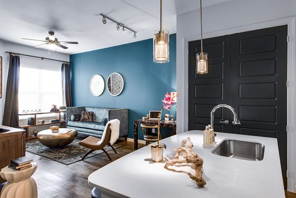 Sleek kitchen with modern appliances in Mezzo Kirby Med Center Apartments