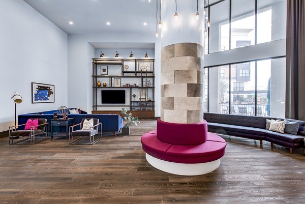 Inviting clubhouse lobby with modern seating at Mezzo Kirby Med Center Apartments, perfect for relaxation and social gatherings