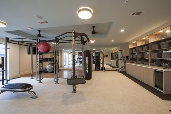 Modern fitness center with state-of-the-art equipment at Mezzo Kirby Med Center Apartments offering a healthy lifestyle for residents