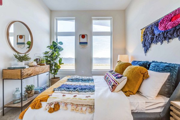 Cozy bedroom with modern decor in Ryder Apartments