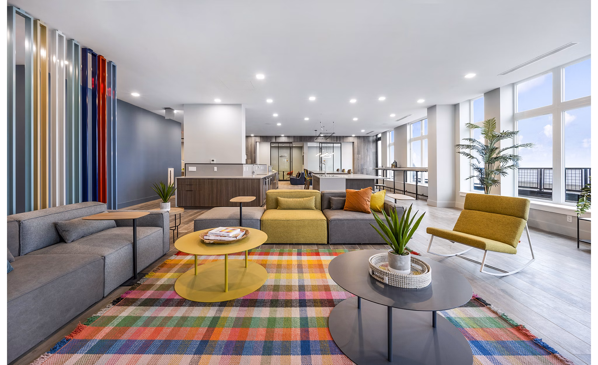 Clubhouse lounge featuring modern furnishings and communal spaces in Ryder Apartments