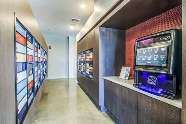 Modern clubhouse mail room at Ryder Apartments featuring secure mailboxes and package lockers