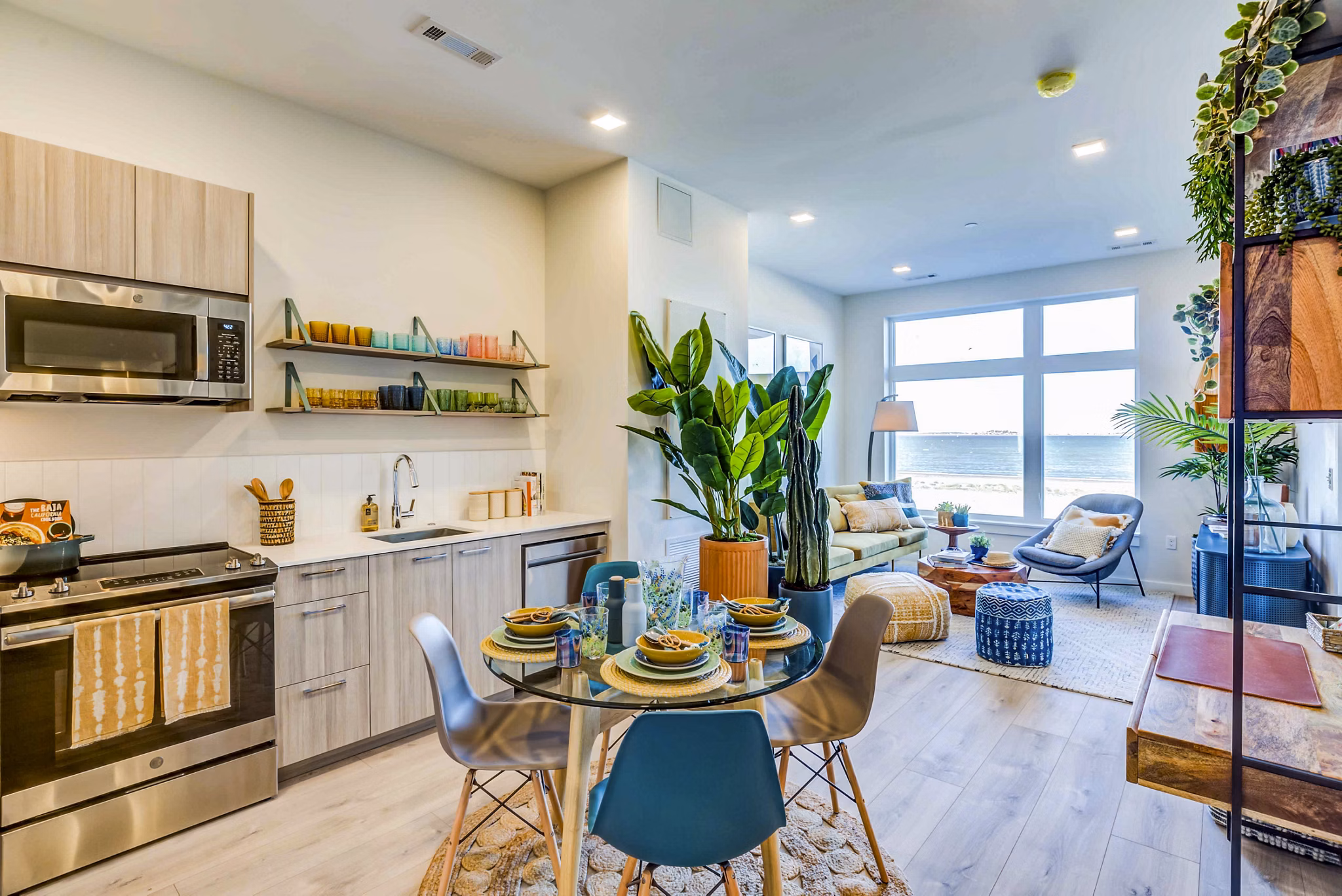 Modern kitchen and dining area with sleek finishes in Ryder Apartments, luxury living spaces by Greystar