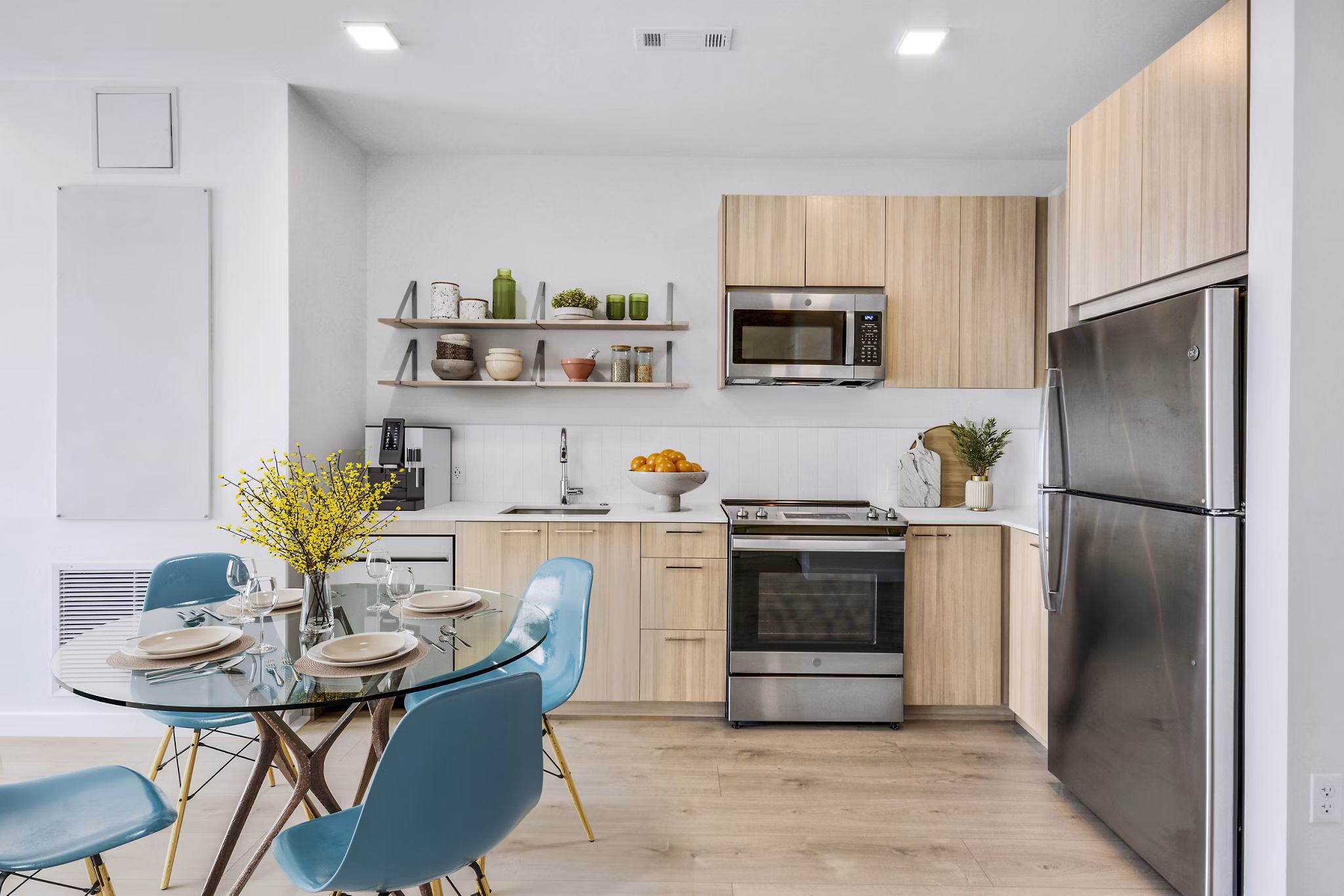 Dining room featuring modern decor and sleek dining set at Ryder Apartments
