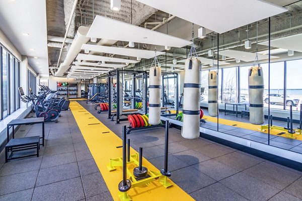 Modern fitness center with state-of-the-art equipment at Ryder Apartments for health and wellness enthusiasts