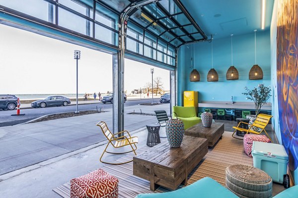 Cozy outdoor patio with comfortable seating at Ryder Apartments: Luxury living in a serene setting