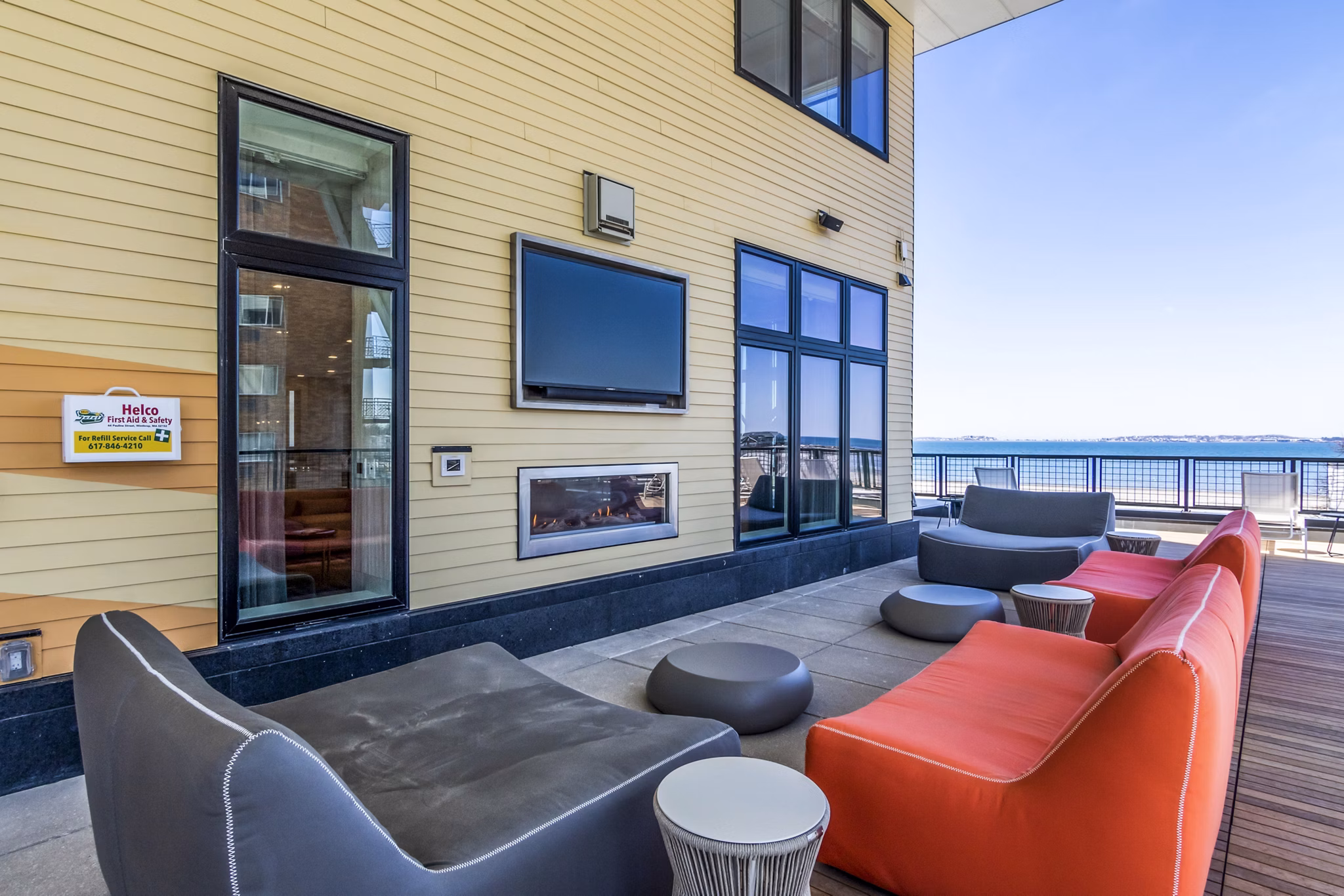 Cozy patio with stylish seating at Ryder Apartments, perfect for relaxing and enjoying the view
