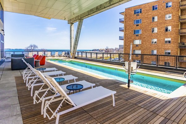 Luxurious rooftop pool with skyline views at Ryder Apartments, ideal for relaxation and entertainment in a vibrant community