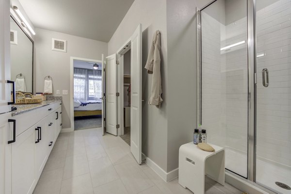 Bathroom featuring modern fixtures at Alder Apartments, a luxury Greystar community
