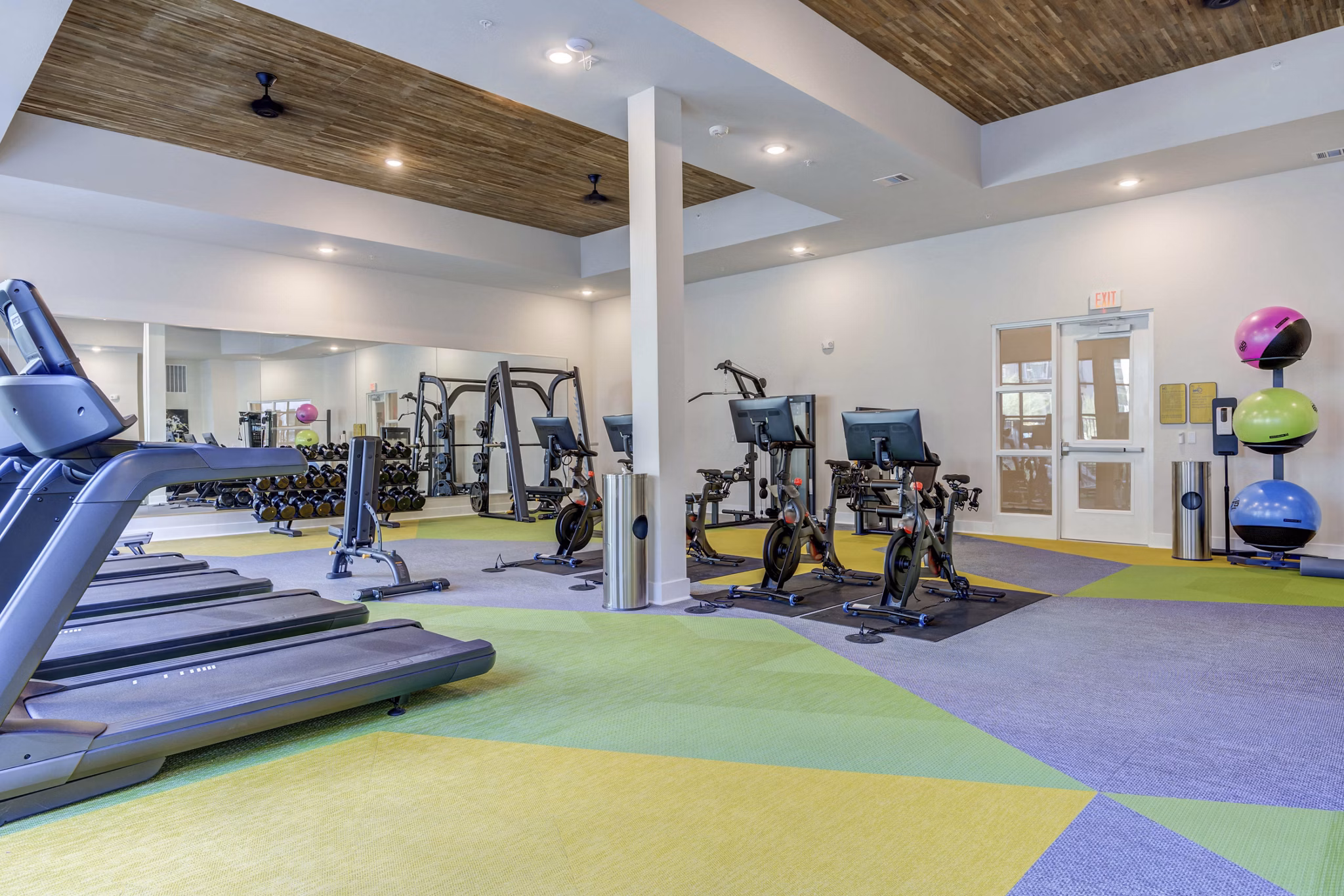 State-of-the-art fitness center with modern equipment at Alder Apartments, ideal for luxury living residents