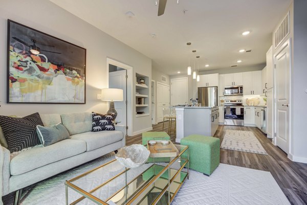 Welcoming living room with cozy seating and modern dÃ©cor at Alder Apartments luxury living