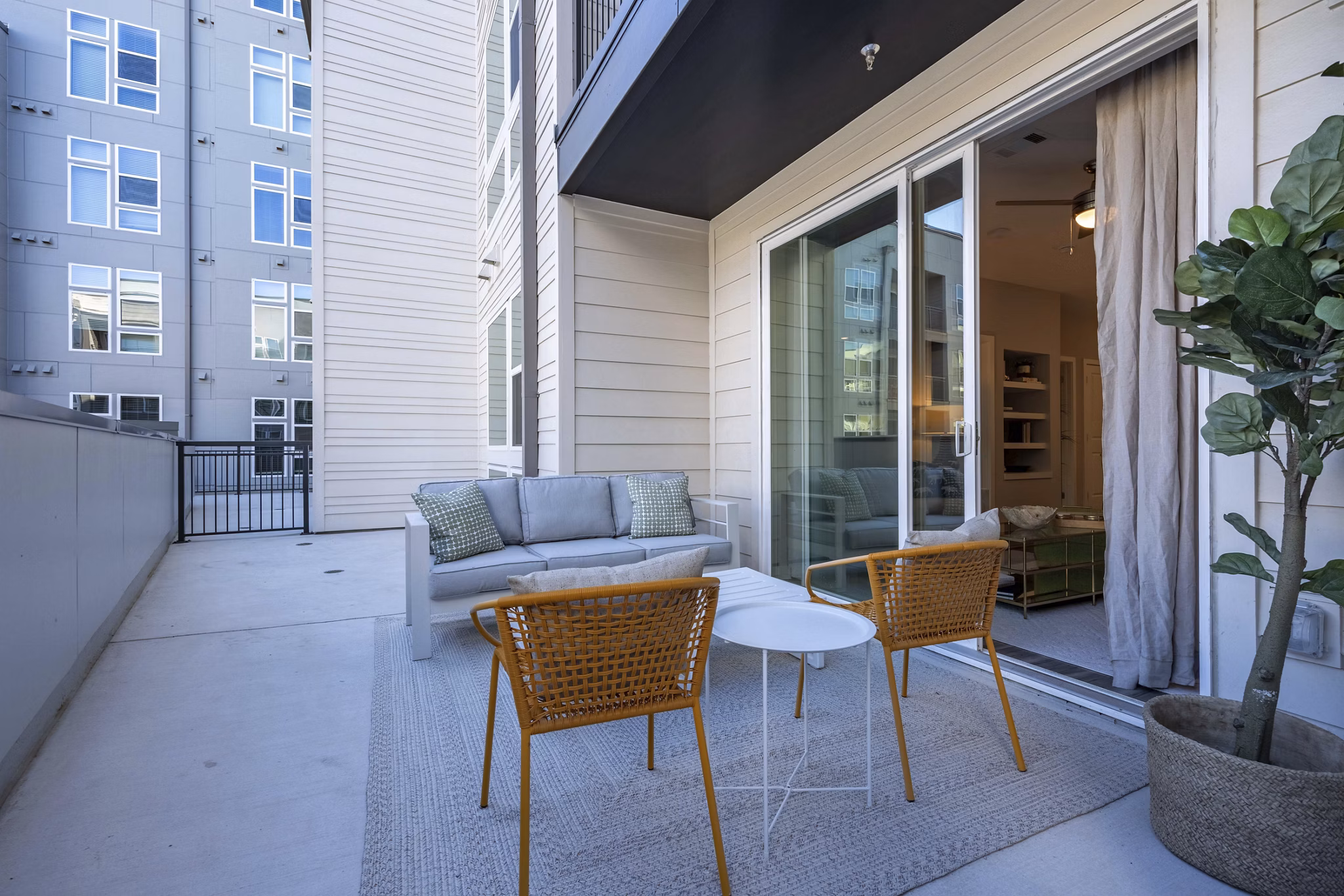 Modern patio with stylish furniture at Alder Apartments, a Greystar luxury apartment community