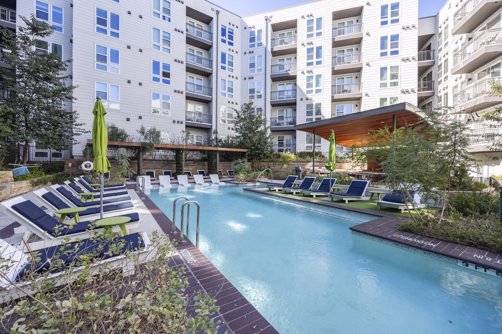 Rooftop infinity pool at Alder Apartments offering stunning views