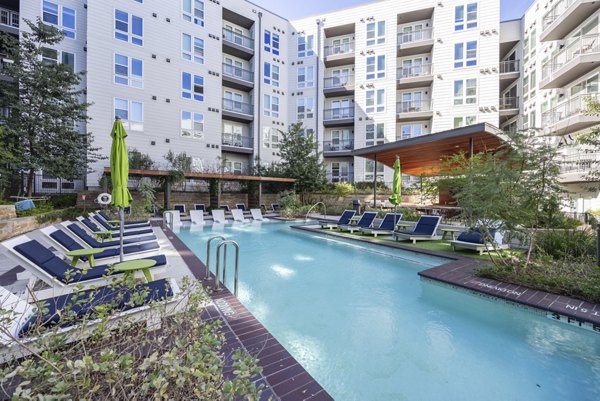 Rooftop infinity pool at Alder Apartments offering stunning views