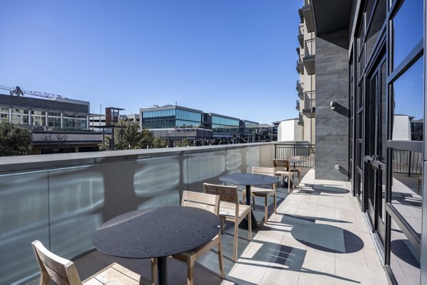 Alder Apartments: Cozy outdoor patio area with modern seating