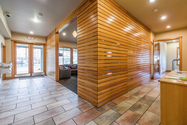 Clubhouse featuring modern design and communal seating at Willamette Gardens Apartments