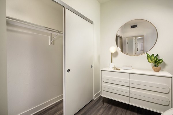 Spacious closet with built-in shelving in Rise Hollywood Apartments