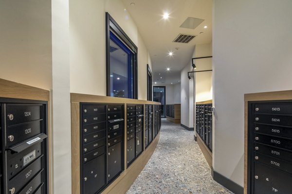 Mail room with secure package lockers at Rise Hollywood Apartments, a luxury property ideal for organized living in the heart of Los Angeles