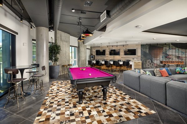 Elegant clubhouse with plush seating and modern design at Rise Hollywood Apartments