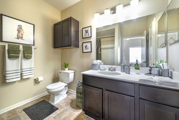 Modern bathroom with sleek fixtures at Hillside Ranch Apartments