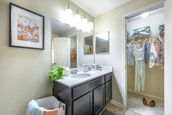 Bathroom with modern fixtures and natural lighting in Hillside Ranch Apartments