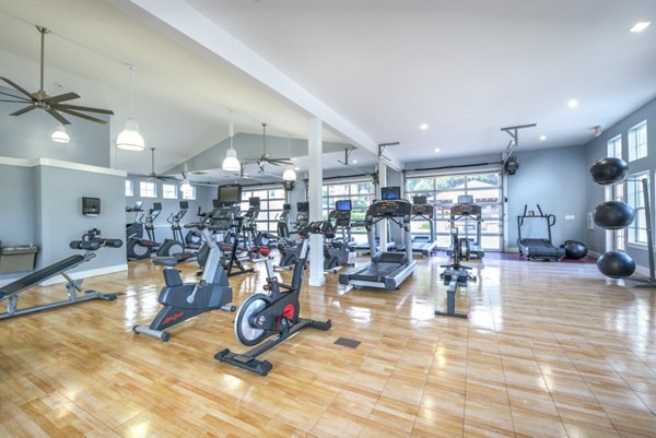 Fitness center with modern equipment at Hillside Ranch Apartments, ideal for an active lifestyle in luxury Greystar community