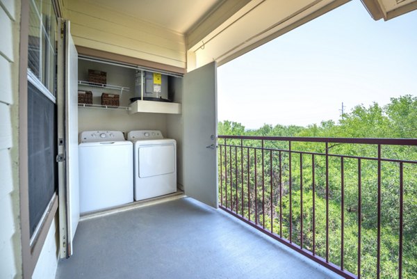 Outdoor patio featuring cozy seating at Hillside Ranch Apartments, ideal for relaxation and social gatherings