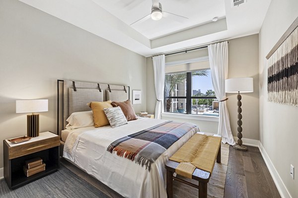 Cozy bedroom featuring modern furnishings at The Westcott Apartments